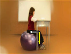 Student sitting on therapy ball